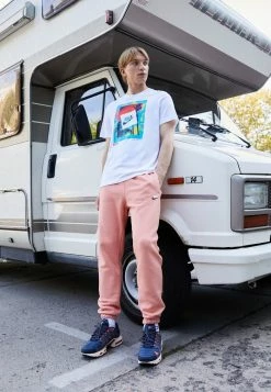 Nike Sportswear CLUB PANT - Tracksuit Bottoms - Light Madder Root