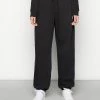 Nike Sportswear CLUB PANT - Tracksuit Bottoms - Black