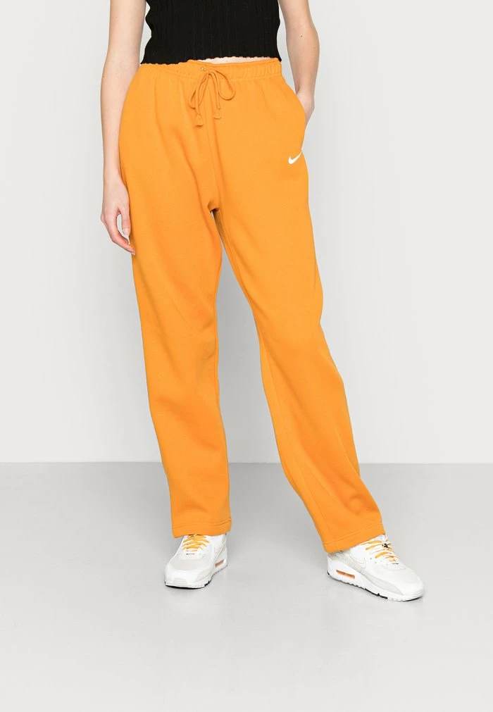 Nike Sportswear PANT - Tracksuit Bottoms - Light Curry/white