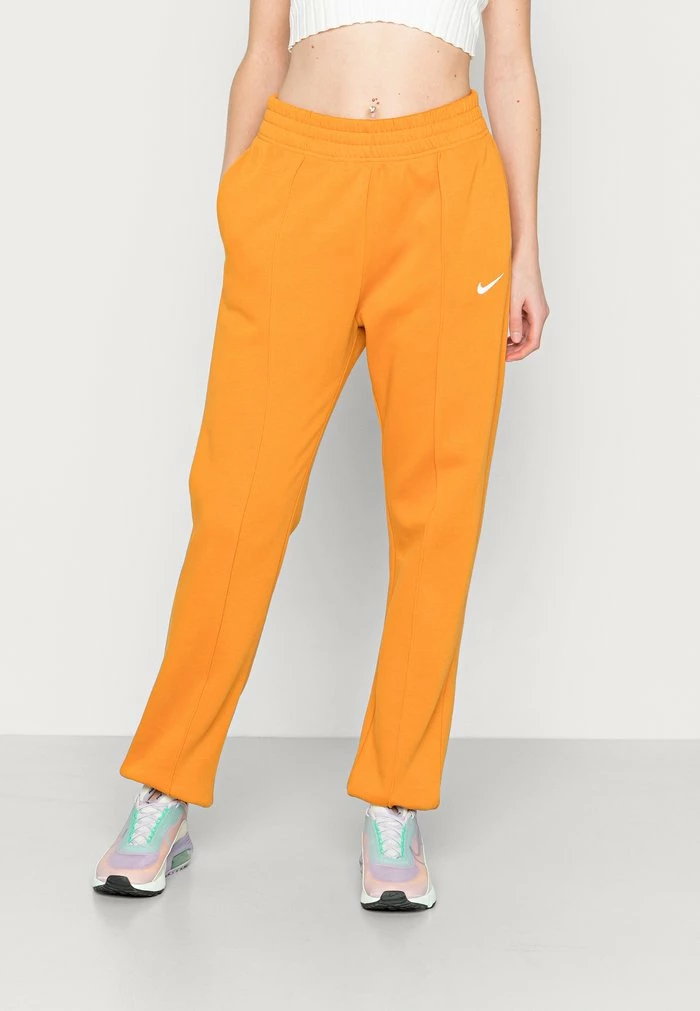 Nike Sportswear PANT - Tracksuit Bottoms - Light Curry/white