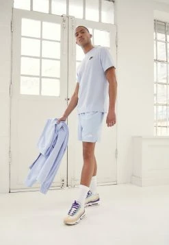 Nike Sportswear CLUB FLOW - Shorts - Light Marine