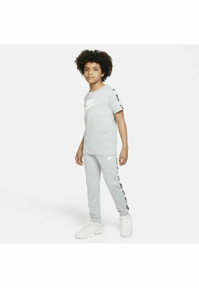 Nike Sportswear REPEAT - Tracksuit Bottoms - Light Smoke Grey White