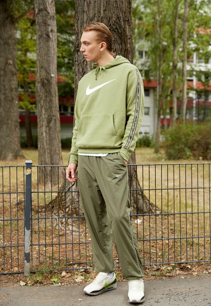 Nike Sportswear AIR PANT - Tracksuit Bottoms - Medium Olive/white