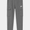 Nike Sportswear CLUB CARGO - Tracksuit Bottoms - Carbon Heather/smoke Grey/white